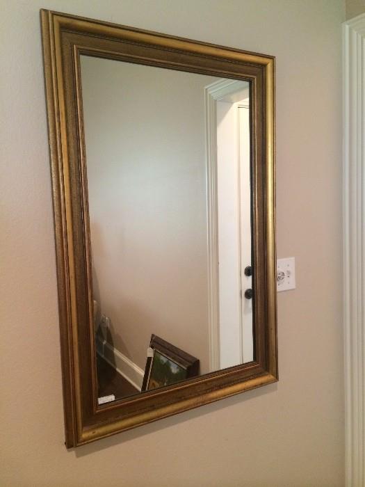 Gold framed mirror