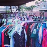 racks on racks of vintage dresses