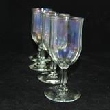 Contemporary iridescent set of four (4) crystal white wine glasses
Condition: Good
Shipping: Yes
Size:5"