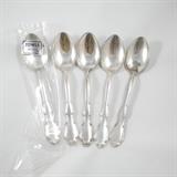Group of 5 Towle Sterling Silver Spoons, one still in plastic Condition: Very good