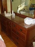 Dresser and mirror to the King bedroom set. Permacraft cherry from Stanford NC