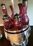 Cranberry glass cruet set sold