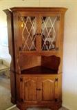 Corner wood hutch with lots of storage and display space.