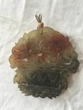 Carved jade pendant