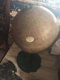 Antque globe on cast iron stand