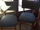 There are five of the mid century modern chairs