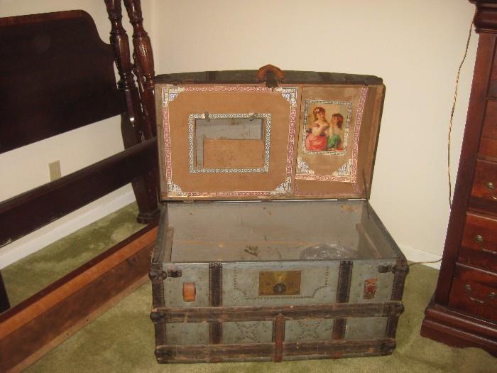 This antique trunk is beautiful inside
