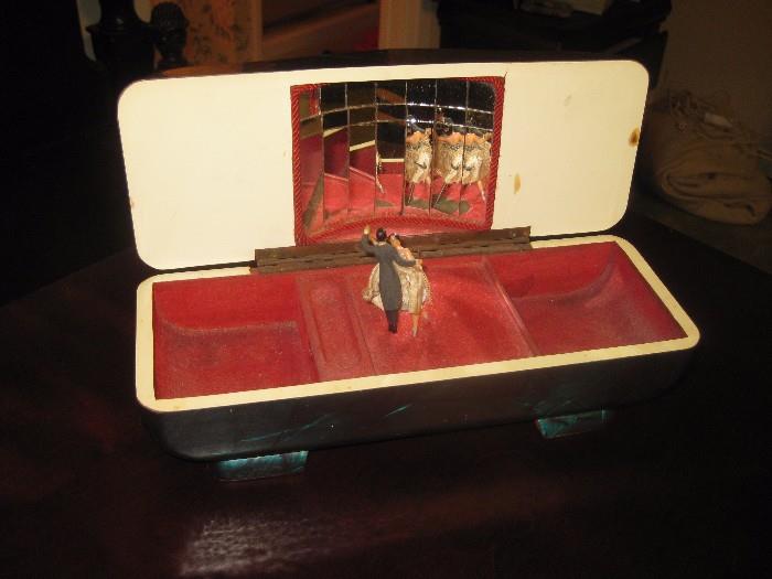 very old lucite music box with ball dancers ( music does not play)
