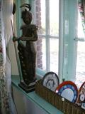 Decorative cast figure & portion of plate collection