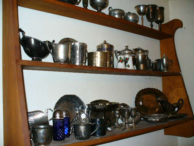 Wall display unit with portion of Metal ware collection