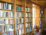 Portion of more than 4000 books in built in bookcases on the main level and basement