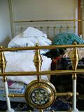 White iron bed with canopy