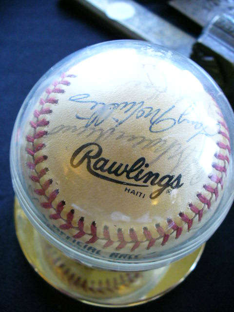 Cardinals Team Signed Baseball in display case