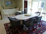 White Marble Table with Black Wicker Chairs