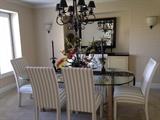 Absolutely beautiful glass top table with 6 chairs. Stunning