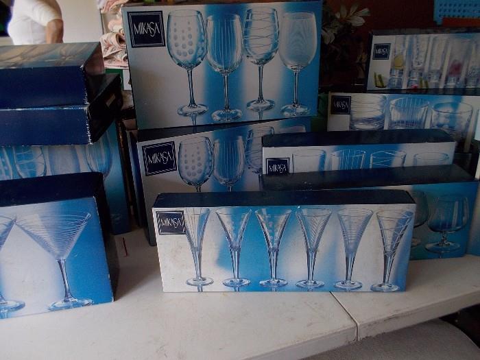 We have this entire set of glasses X2, including ice bucket, shot glasses, 2 different champagnes ...