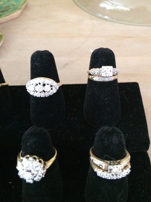 Two Wedding sets (right) and two diamond Anniversary rings (left)