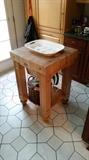 In the kitchen is a freestanding butcher-block.  You'd be surprised how useful this will be in your kitchen.