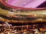 Closeup of Rare C/1920 Henri Selmer, Paris, lacquered Saxophone, 1905 Gold medal inscription, no neck or mouthpiece but does have original case in great condition