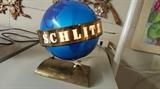 Schlitz globe lamp