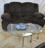 Loveseat and contemporary glass top coffee table