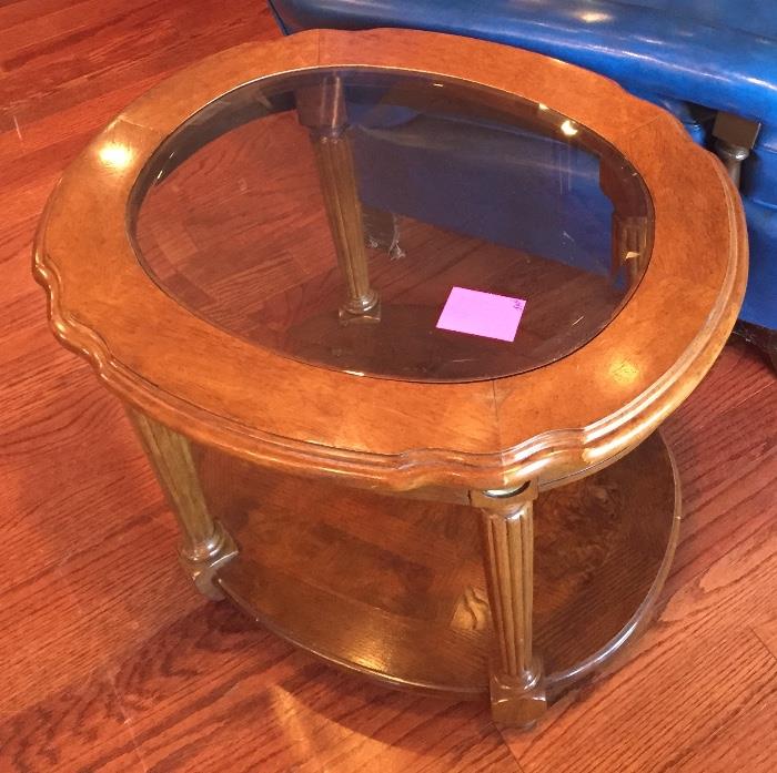 Oval and glass end table in Bargainville.