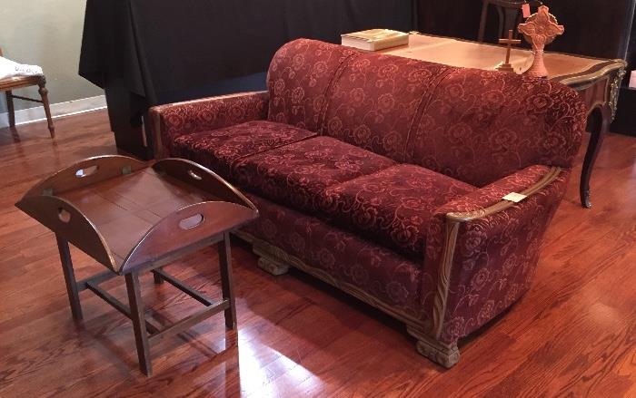 Antique velvet sofa and butler's table.
