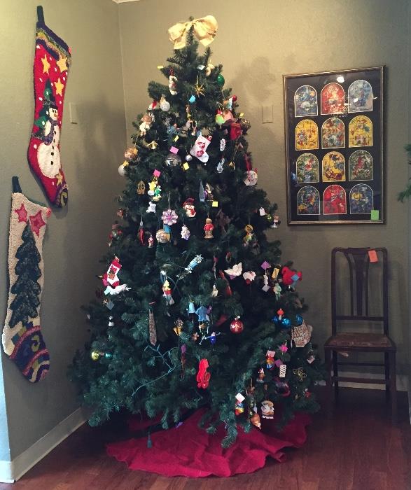 Lots of ornaments to add to your tree, huge needlepoint stockings, art, and antique chair.