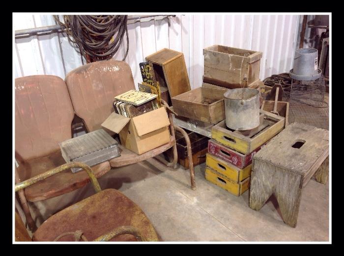 Vintage license plates, lawn chairs, primitive bench and boxes, wood drink crates, camp stove