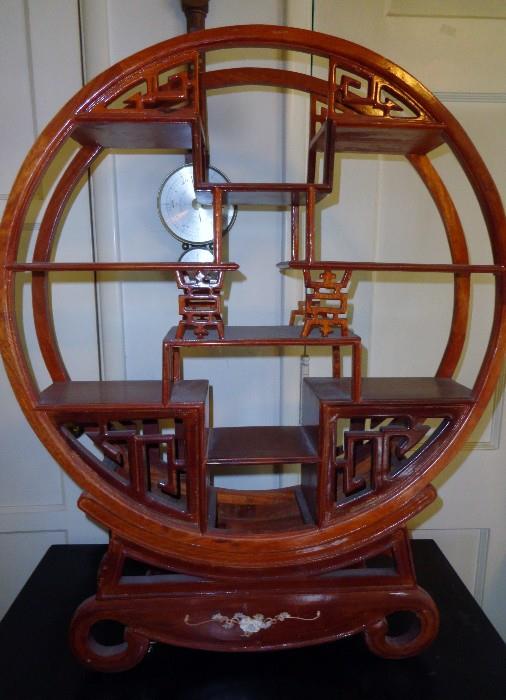 Round Asian wooden curio display stand
