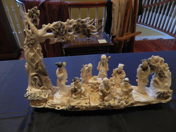Very intricate Ivory Colored Asian carving attention detail is amazing                                                         Measures 18 inches x 10 inches Item 0127