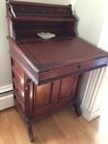 Small writing desk with key, and side drawers.