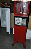 Gumball or candy machine takes quarters and has the keys. Vintage game room and toys and poker, gaming and fun stuff