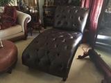 Black leather chaise lounge