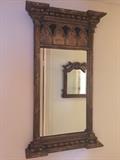 Fancy gilt wood framed beveled mirror