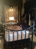 Iron single bed with lovely bedding