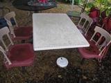 really cool think its fast food rest. table with 4 attached chairs