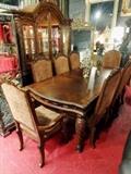 DINING TABLE WITH LEAF AND 8 CHAIRS, CARVED WOOD APRON, MATCHING BREAKFRONT AND BUFFET SOLD SEPARATELY, EXCELLENT GENTLY
