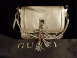 GUCCI METALLIC GOLD 'BORSA BELLA' ORIGINAL GG BAG WITH WOVEN GOLD LEATHER STRAP AND DETACHABLE SHOULDER STRAP. FEATURES 
