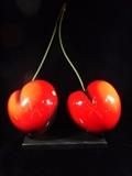MARC SIJAN SCULPTURE, TWO CHERRIES, HYDRASTONE ON STONE BASE