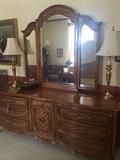 Triple dresser; pair of brass lamps