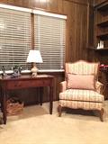 Antique writing table and French provincial chair.