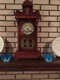 Pair of Saraski blue glass bowls and reproduction mantle clock.