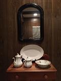 Washstand, Victorian mirror and Old Paris tableware.