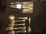 12 five piece place settings of Roger's silver-plate.