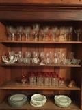 Large set of "Navarre" by Fostoria and red "King's Coin" tumblers. "Navarre" is priced by individual sets.