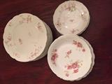 Odd sets of Limoges and Haviland tableware.