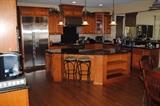 All Countertops Shown (Ubba Tubba Granite), Islands and Cabinets, Refridgerator, Lights, Sink, Faucet, etc