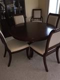 GORGEOUS ROUND DINING ROOM TABLE WITH 6 CHAIRS AND EXTRA LEAF ( SOLID WOOD )