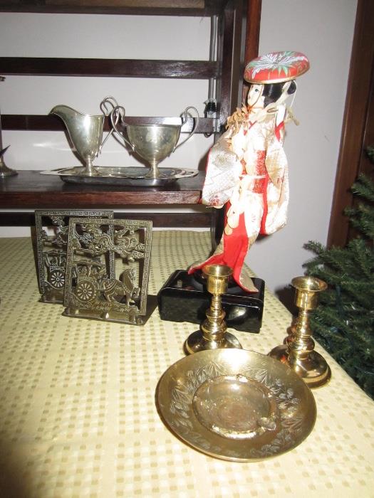 brass bookends, turning doll, candlesticks